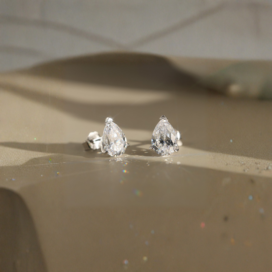2ctw Pear-Shaped Moissanite Stud Earrings | 1ct Each in Rhodium-Plated 925 Sterling Silver