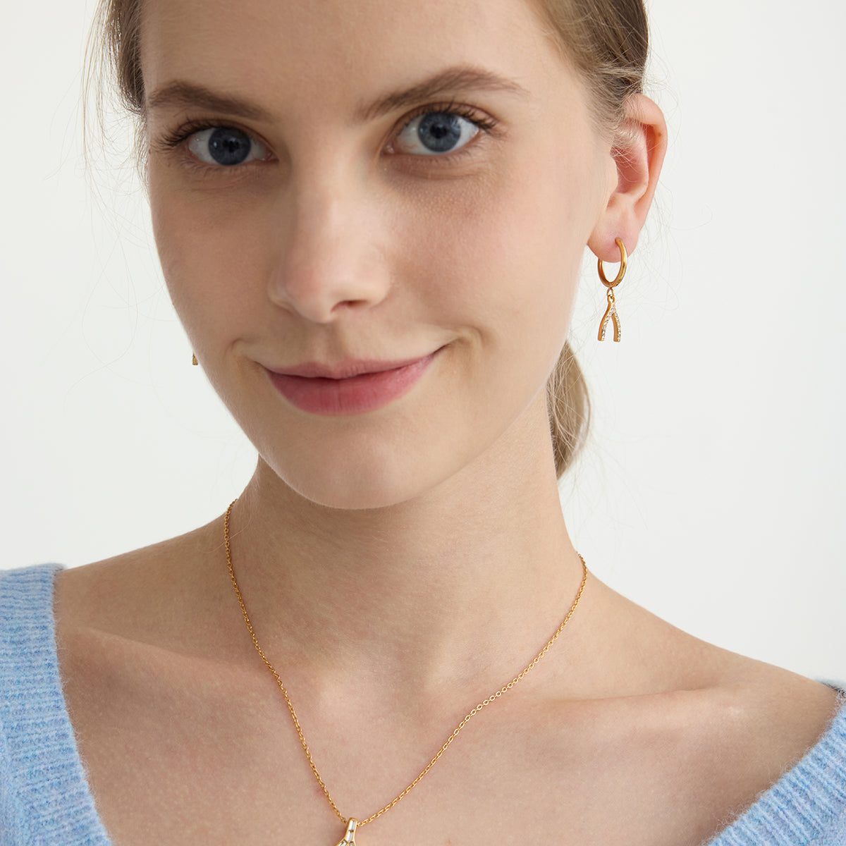 Calina – White Zircon Wishbone Pendant Earrings, 18K Gold Finish